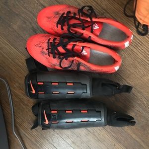 Adidas Soccer cleats with accessories